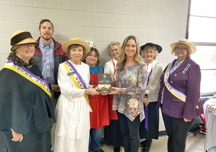 DAR presents book to library